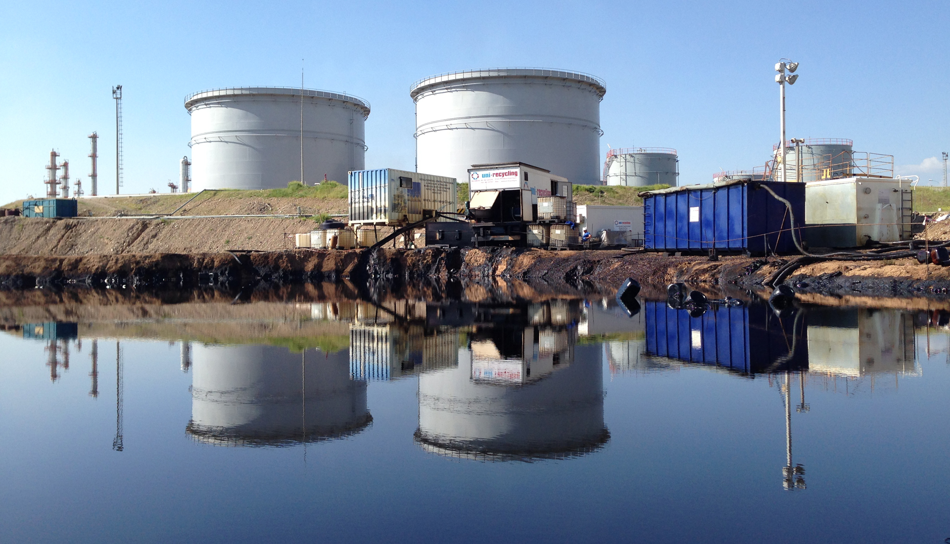 Oil sludge treatment slide